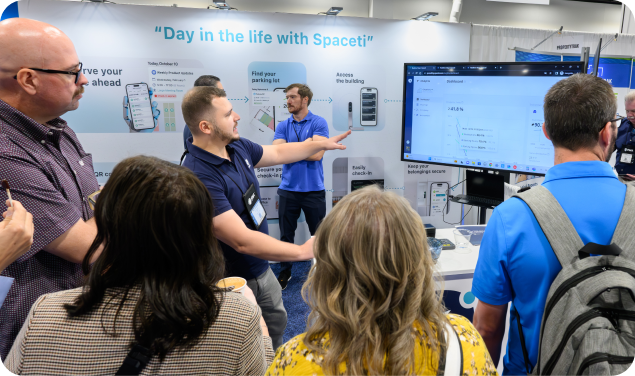 People engaging at exhibition